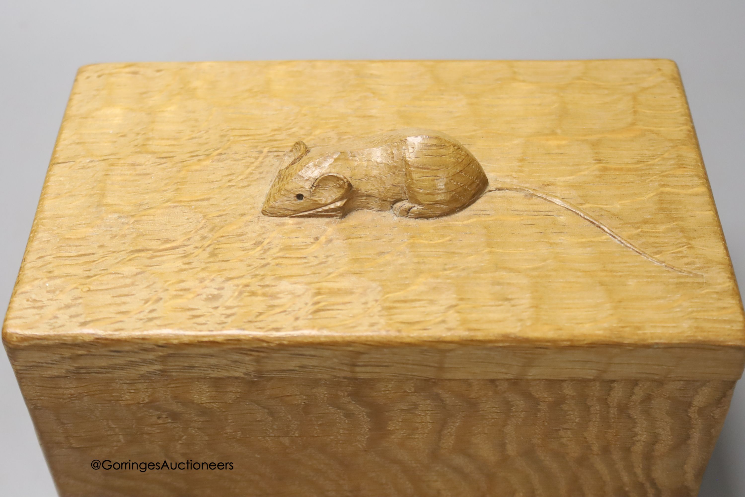 A Mouseman carved oak box and cover, 19cm